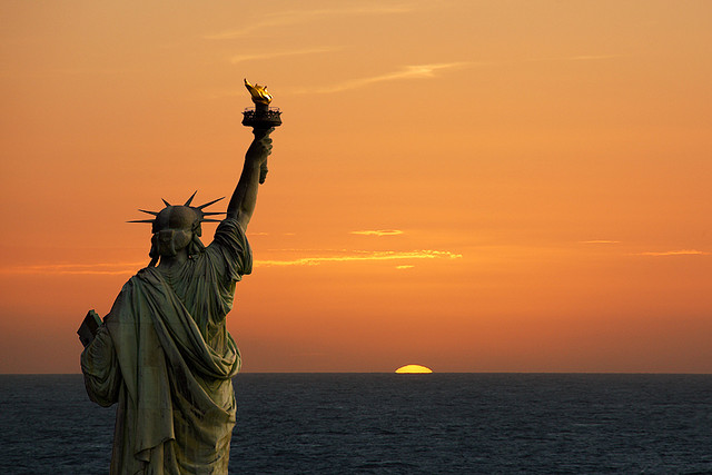 Symbols statue of liberty sunrise